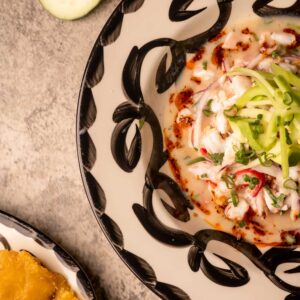 Mariposas Ceviche de Camaron: shrimp, red onion, cucumber, avocado, aceite de chile.