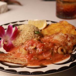 Mariposas Pescado Jarocho: catch of the day, Veracruz style tomato based salsa, cilantro lime rice, fried plantain.