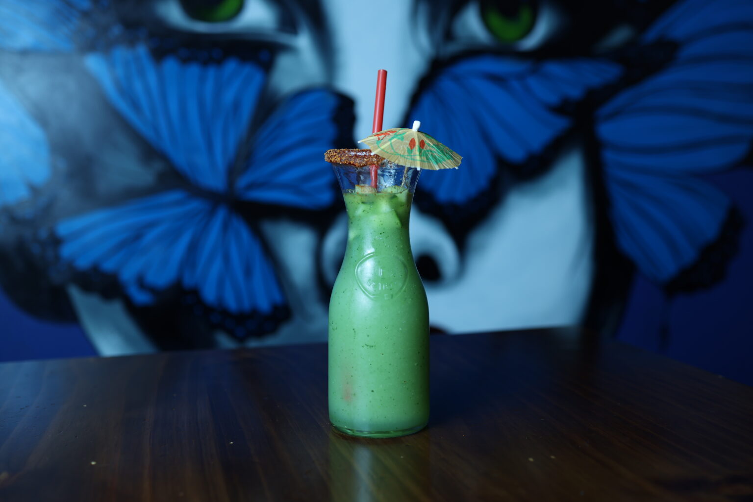 A colorful signature cocktail at Mariposas